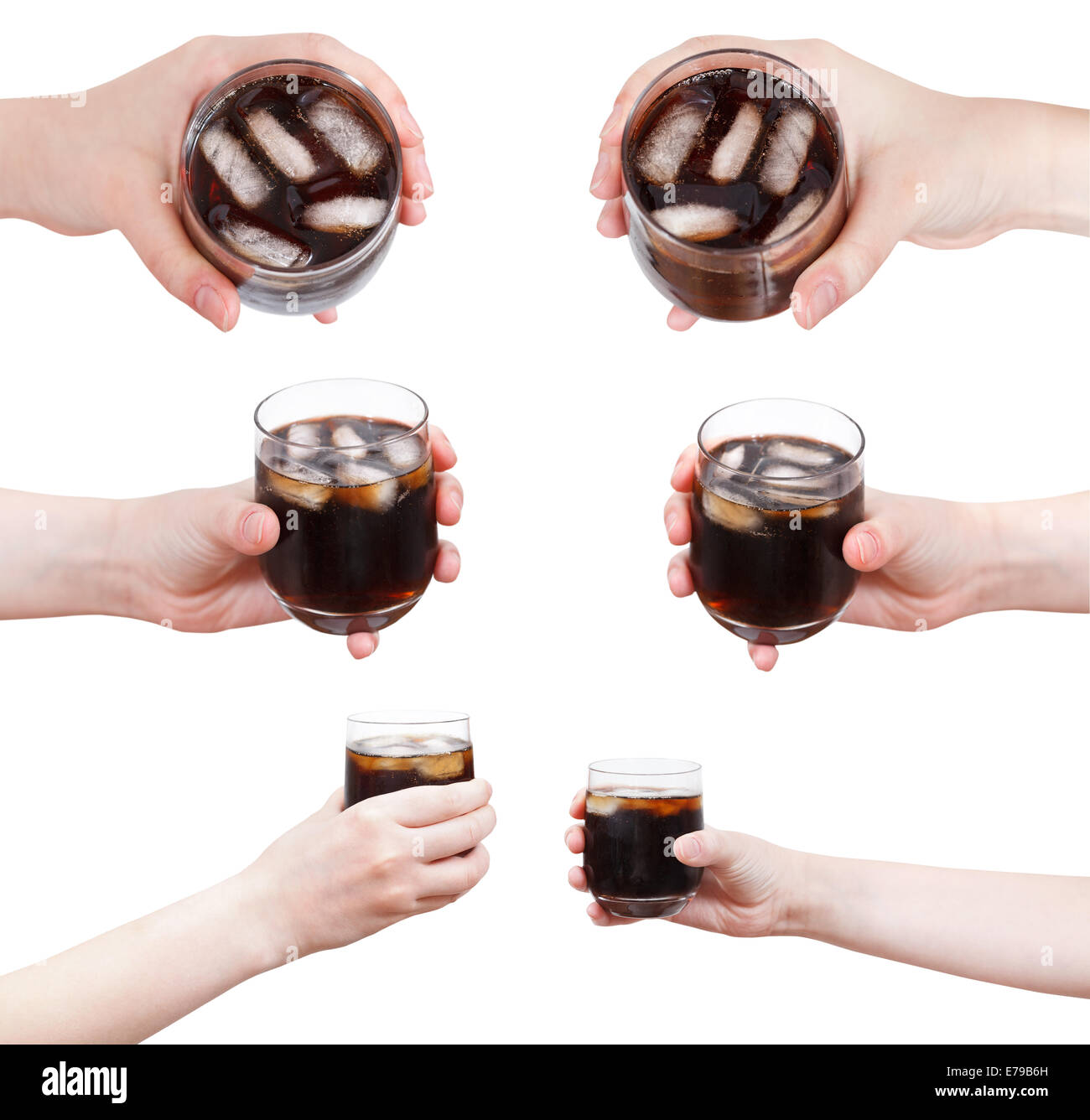 Ensemble de main est titulaire d'une boisson avec de la glace en verre isolé sur fond blanc Banque D'Images