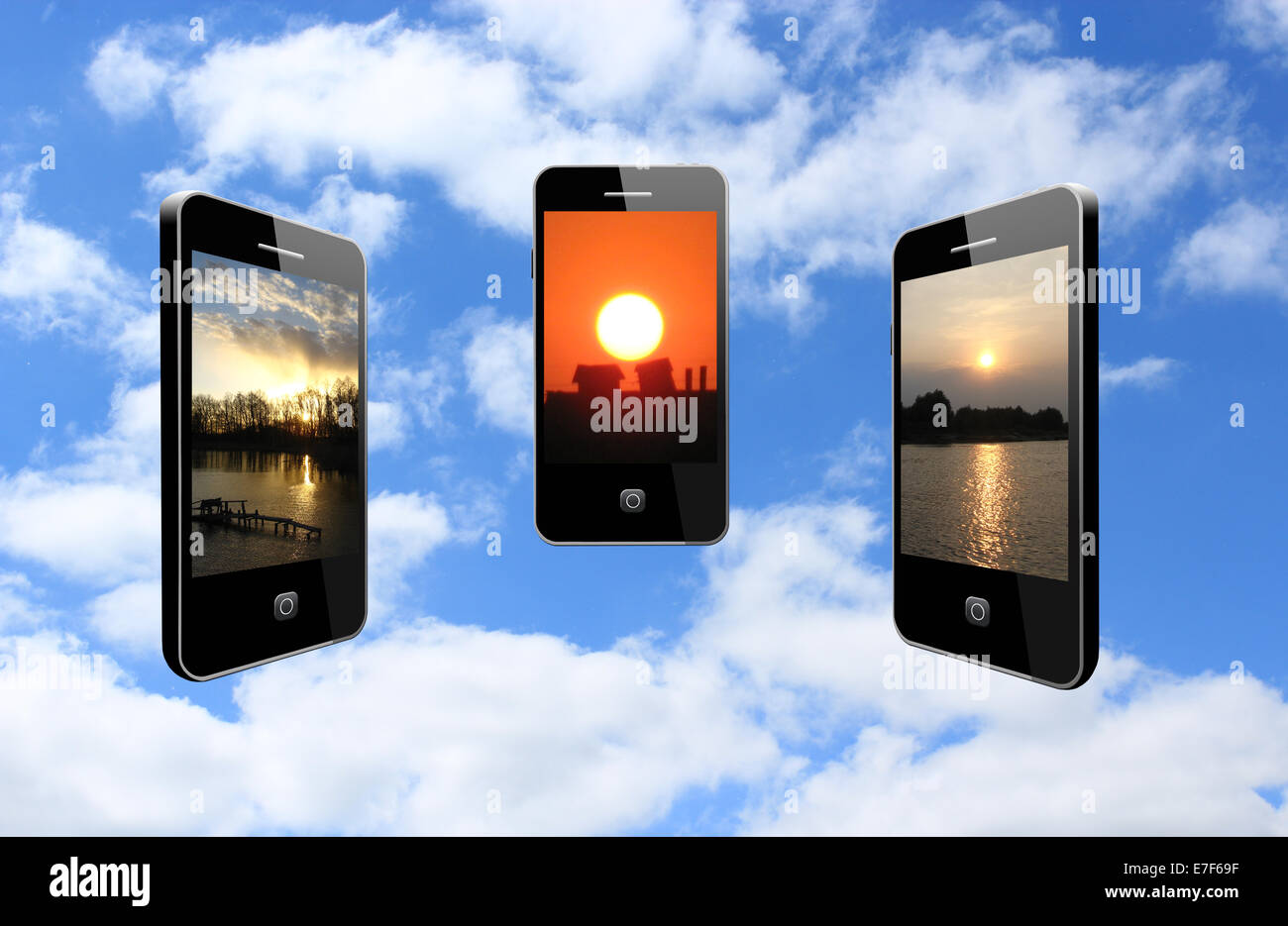 Trois téléphones mobiles modernes avec des couchers de soleil Banque D'Images