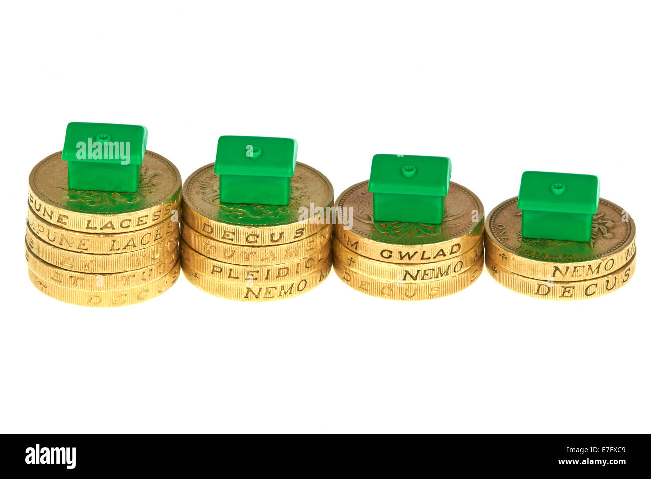 Maisons sur la diminution du monopole des piles de pièces Livre Banque D'Images