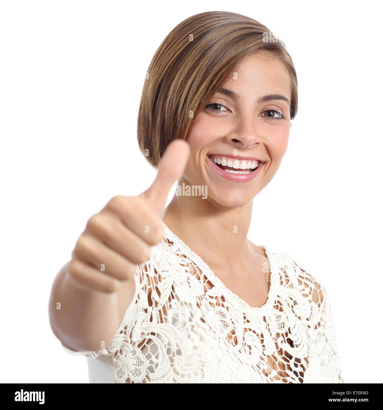 Femme de beauté avec un sourire parfait et des dents blanches gesturing thumb up isolé sur fond blanc Banque D'Images