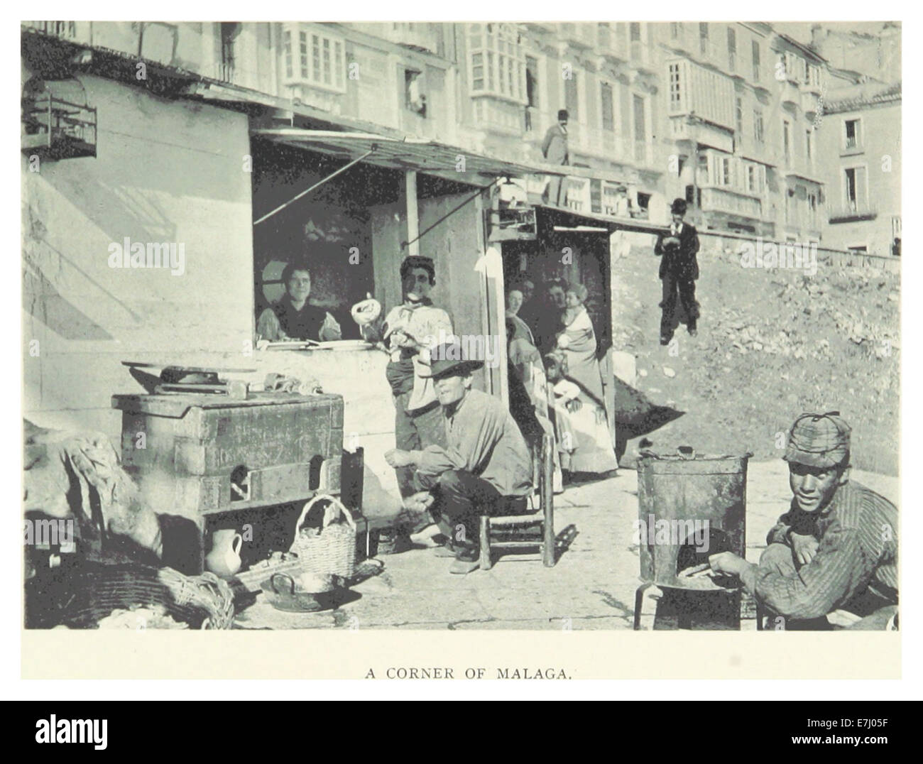 Une illustration de l’œuvre de Lambart de 1895, représentant un coin de Malaga. La carte et la photo offrent une vue du paysage urbain et des caractéristiques historiques de la ville. Banque D'Images