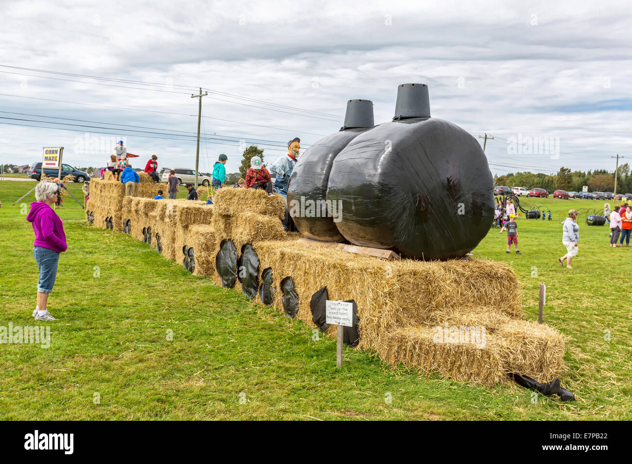 Summerside, Prince Edward Island, Canada, 21 sept., 2014. Les enfants et les parents participent à des activités à la Journée Portes Ouvertes à Summerside, Î. L'événement de la Journée agricole portes ouvertes est organisé chaque année et voir plus de 20 exploitations agricoles de l'Île du Prince Édouard ouvert au public offrant des activités amusantes et interactives pour en apprendre davantage sur la vie à la ferme. Credit : Verena Matthieu/Alamy Live News Banque D'Images