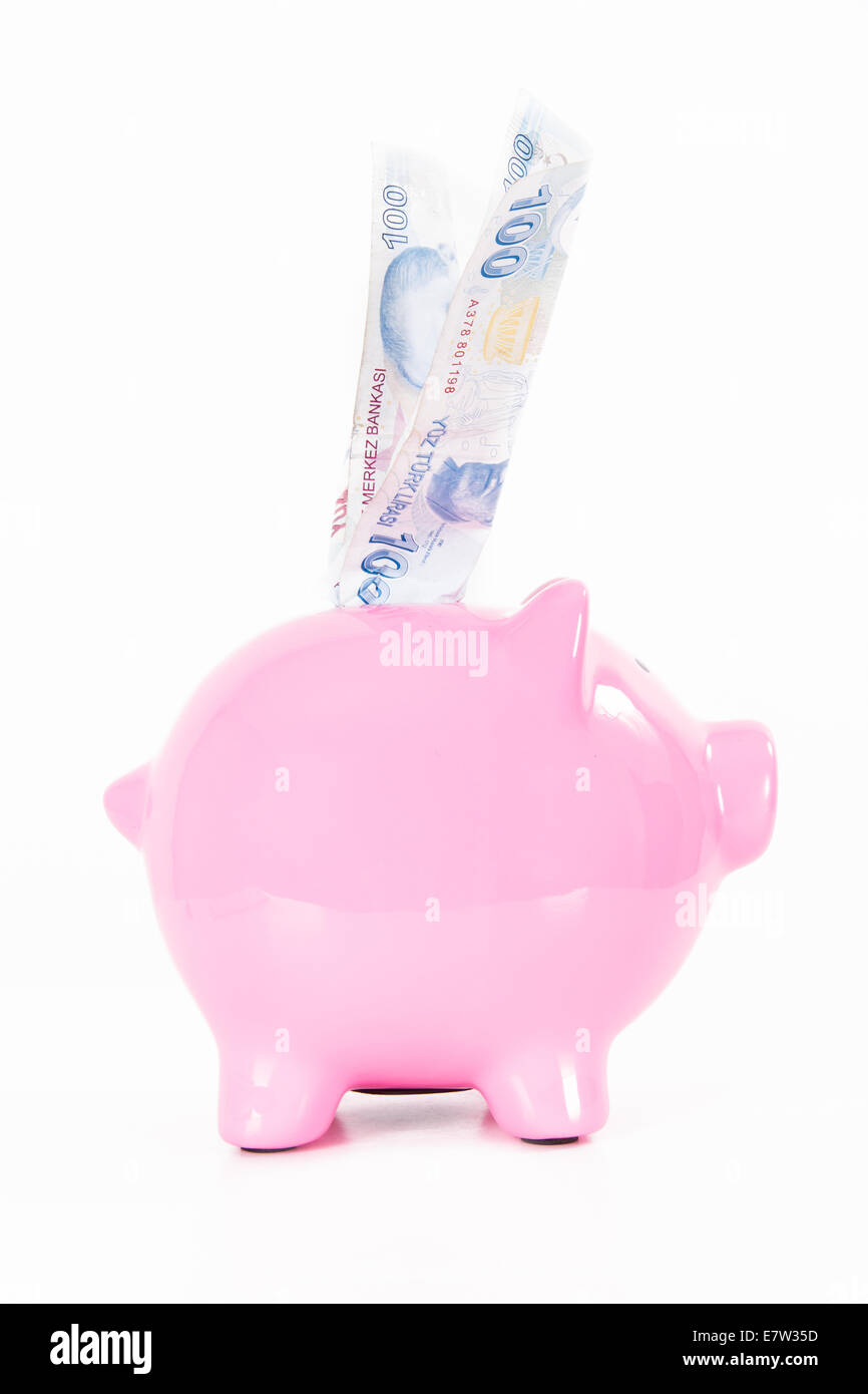 Une centaine de livres turques en billets pink piggy bank, isolé sur fond blanc. Banque D'Images