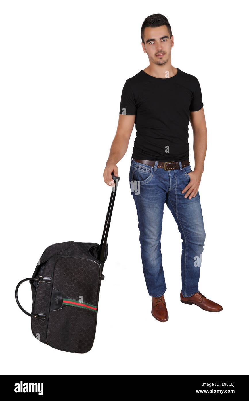 Jeune homme avec une valise sur le fond blanc Banque D'Images