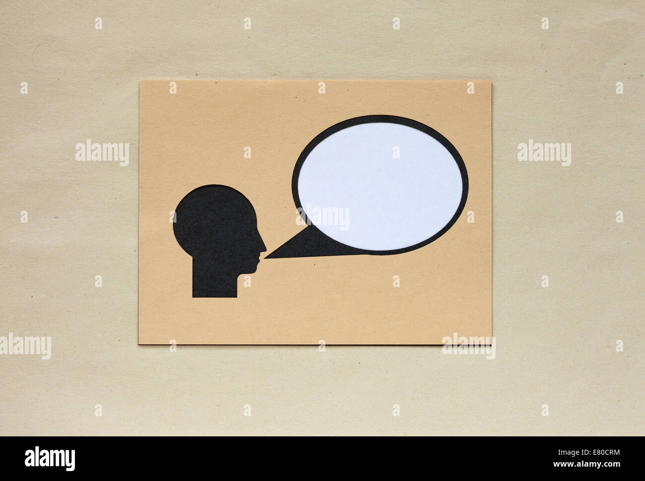 Man - coupe papier - speech bubble Banque D'Images
