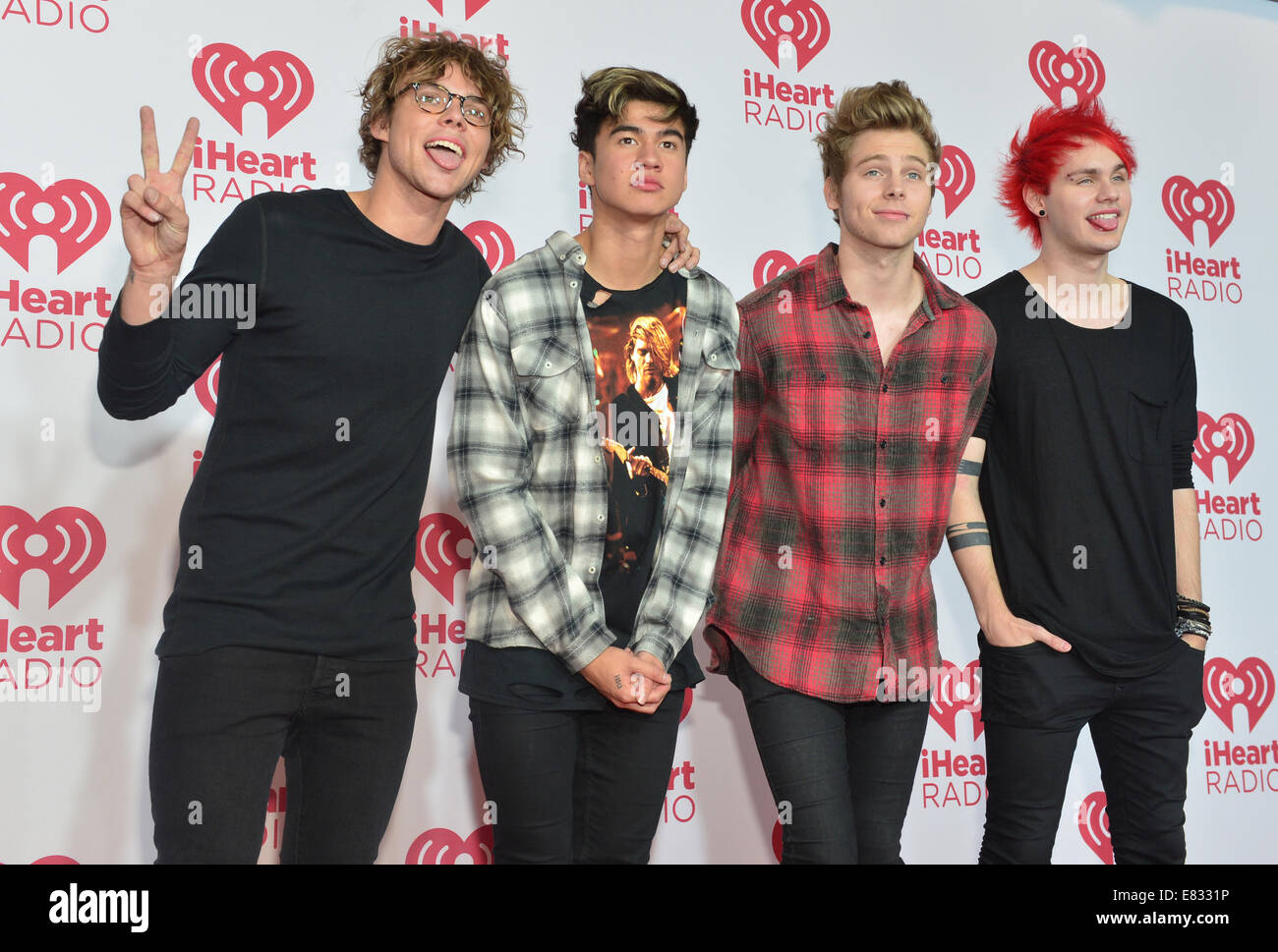 Les membres du groupe pop 5 secondes de l'été 2014 assiste au iHeartRadio Music Festival à Las Vegas Banque D'Images