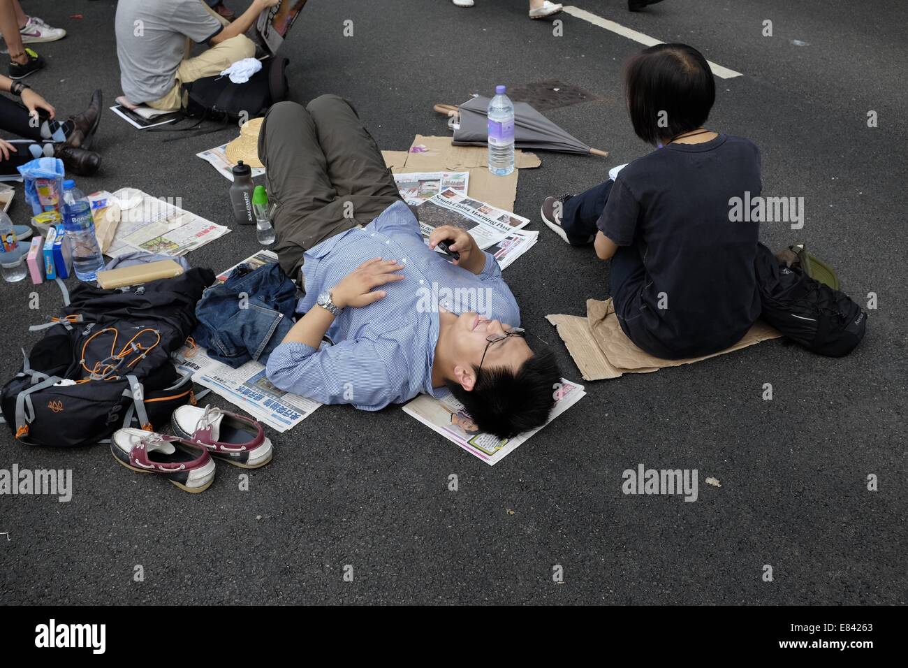 Les protestataires se détendre dans le quartier central de Hong Kong Banque D'Images