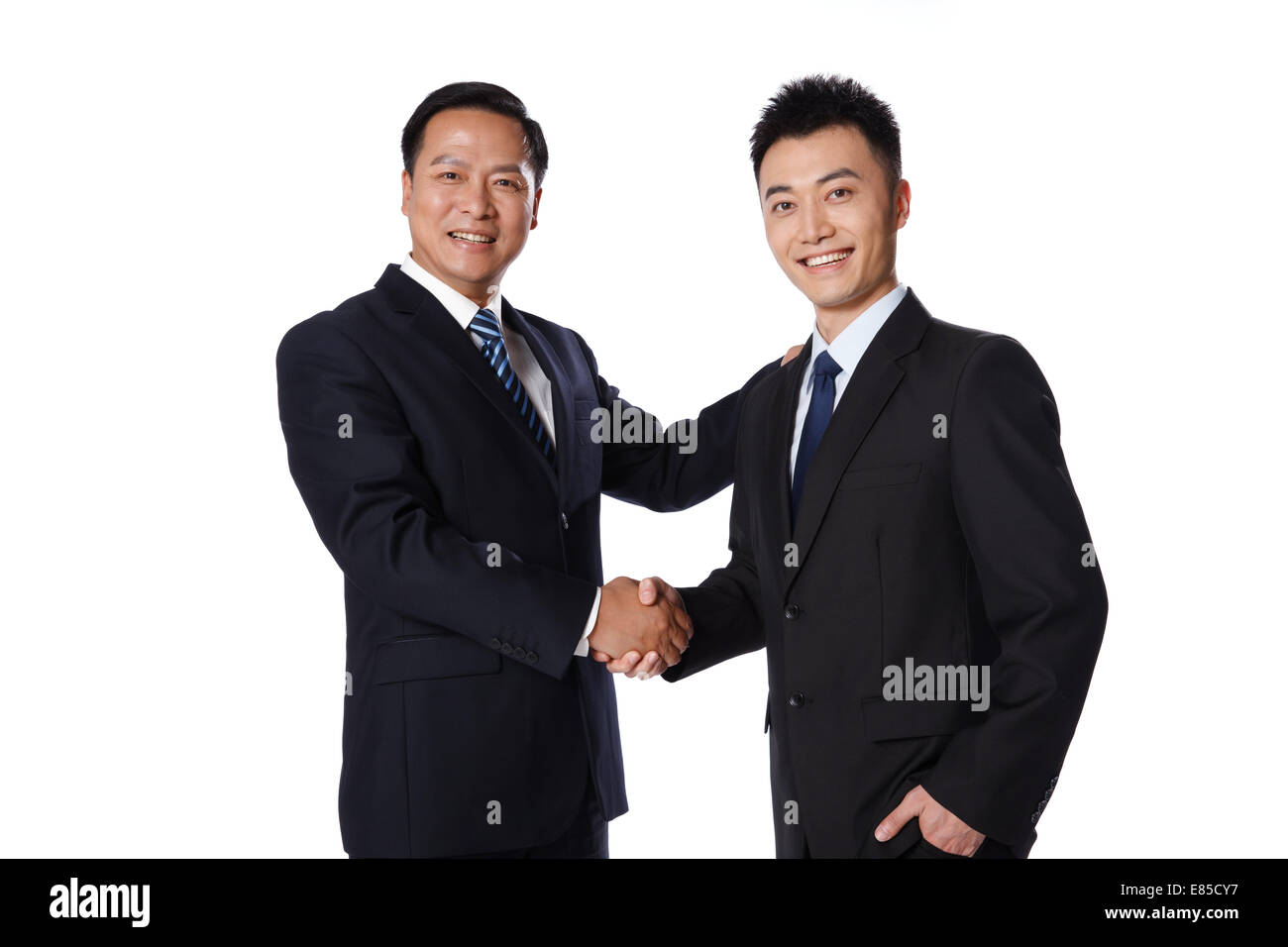 Businessmen shaking hands Banque D'Images