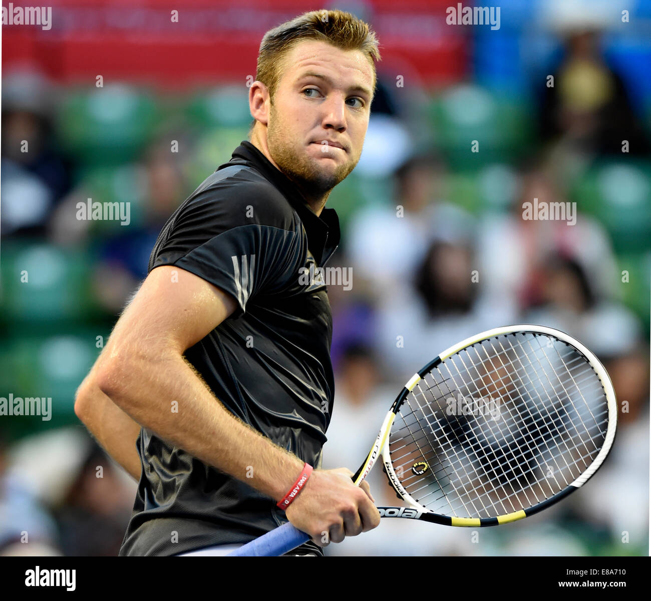 Tokyo, Japon. 3e oct, 2014. Jack Sock des États-Unis réagit après avoir marqué un point au cours de la au match quart Rakuten Japan Open Tennis Championships 2014 contre Benjamin Becker de Allemagne à Tokyo, Japon, le 3 octobre 2014. Credit : Stringer/Xinhua/Alamy Live News Banque D'Images