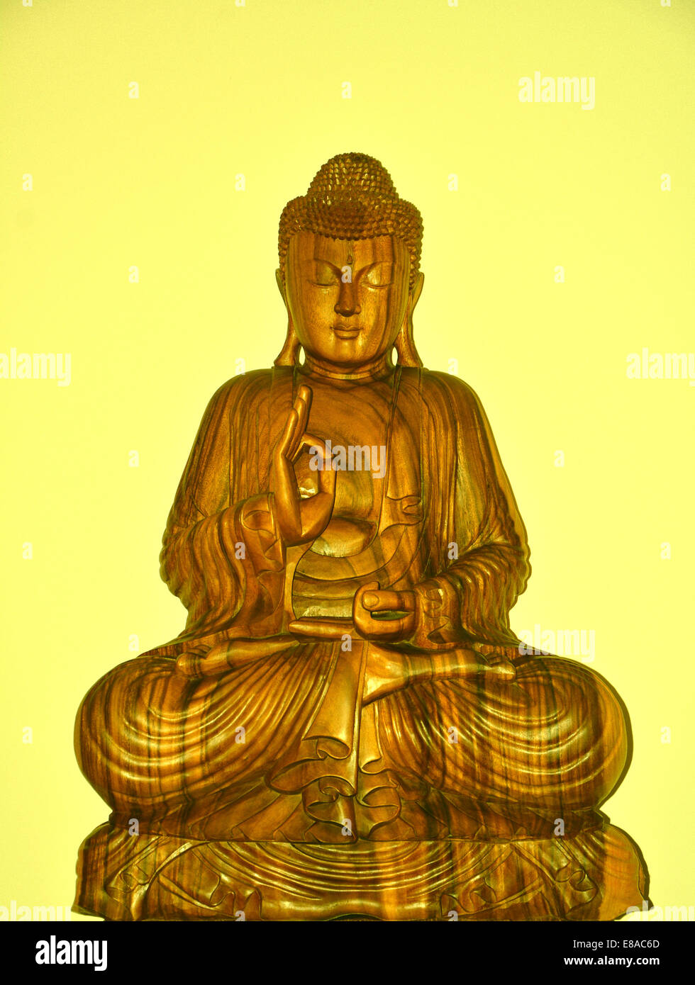 Bouddha assis jaune Banque D'Images