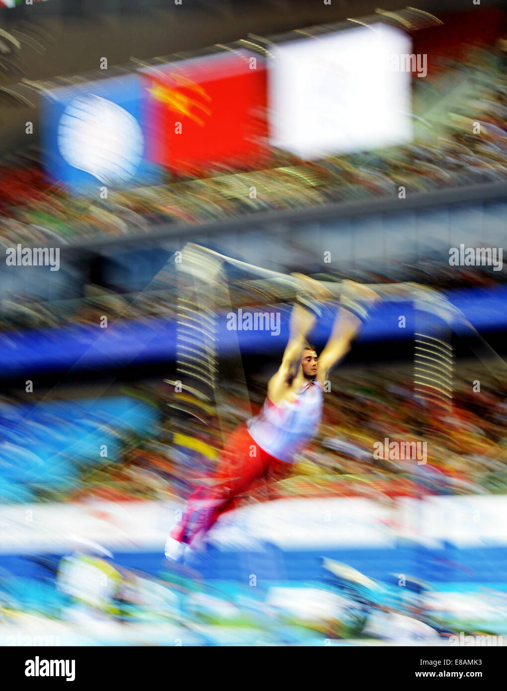 Nanning, Chine, région autonome Zhuang du Guangxi. 3e oct, 2014. Kristian Thomas de Grande-Bretagne effectue sur la barre horizontale au cours de la ronde de qualification des hommes de la 45e Championnats du monde de gymnastique à Nanning, capitale de la Chine du Sud, région autonome Zhuang du Guangxi, le 3 octobre 2014. La 45e FIG Championnats du Monde de Gymnastique artistique dure de 3 à 12 octobre à Nanning. Credit : Wang Yuguo/Xinhua/Alamy Live News Banque D'Images