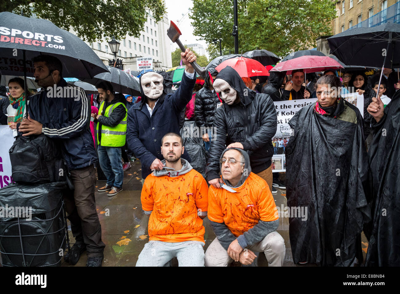 Londres, Royaume-Uni. 4ème Oct, 2014. Des manifestants anti-guerre kurde État islamique stade 2014 exécutions style Crédit : Guy Josse/Alamy Live News Banque D'Images