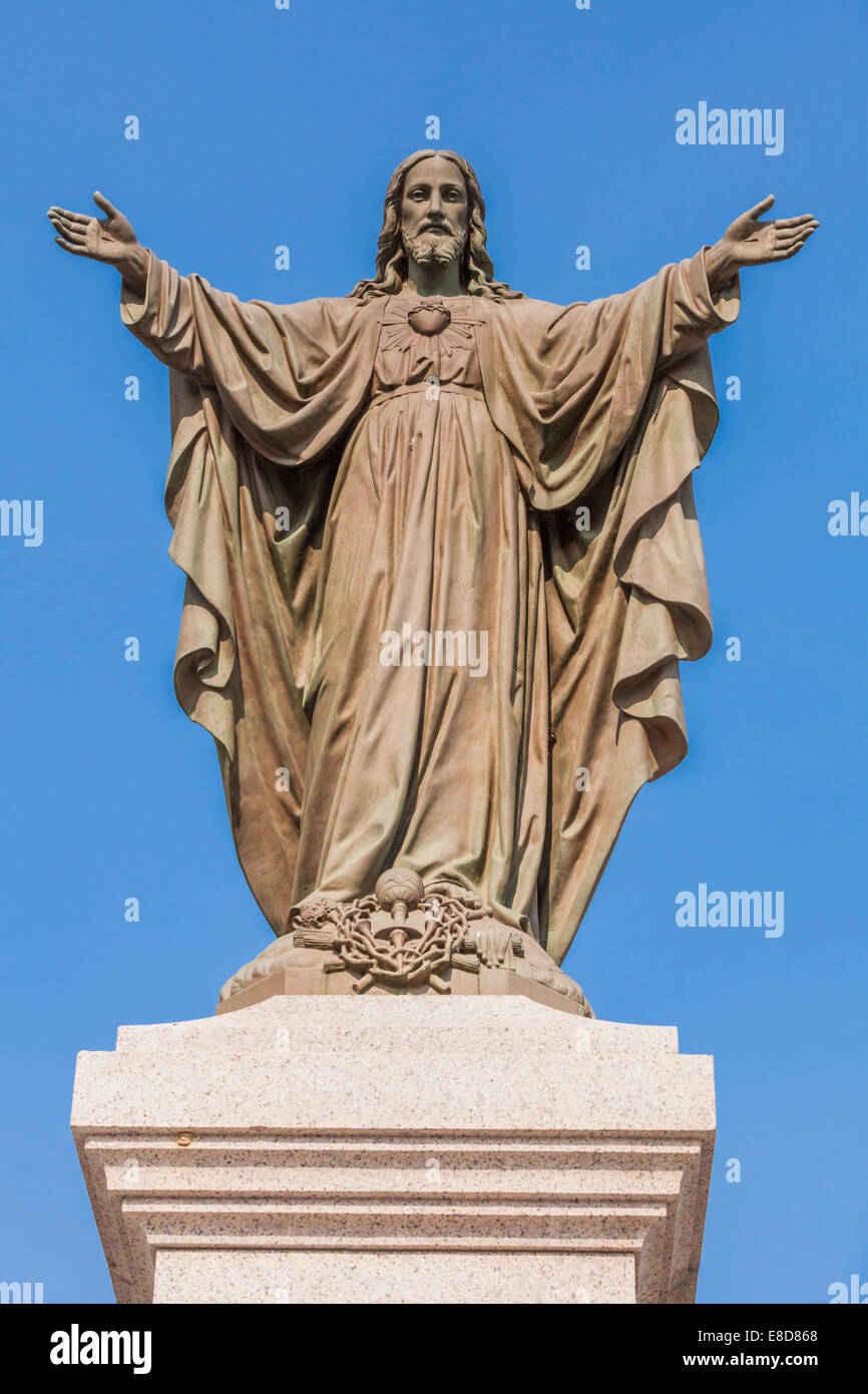 Une statue de Jésus avec les bras ouverts Banque D'Images