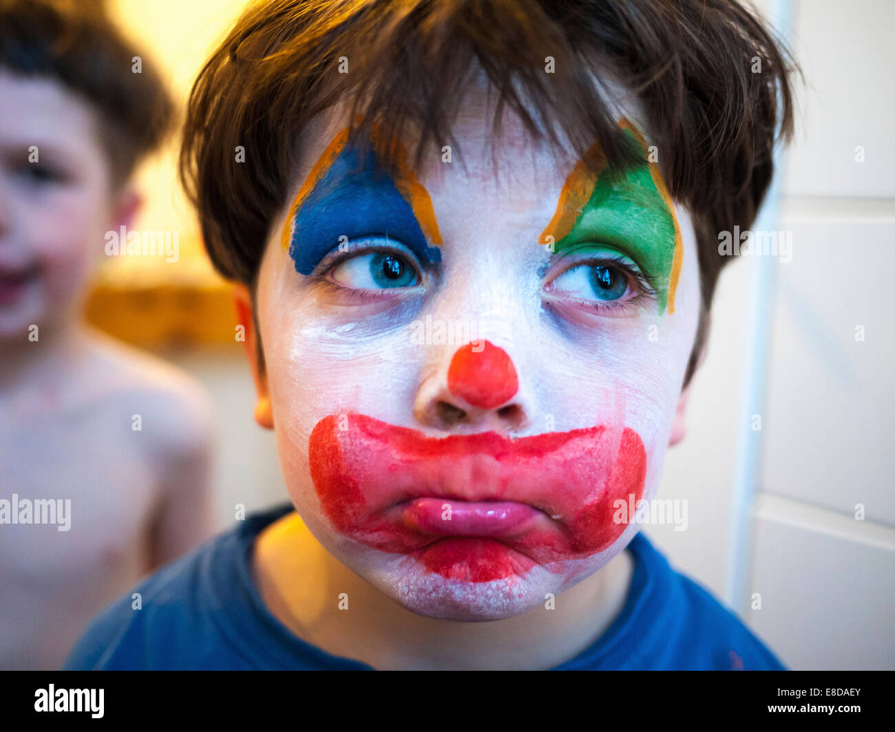 Enfant avec un maquillage de clown, Allemagne Banque D'Images