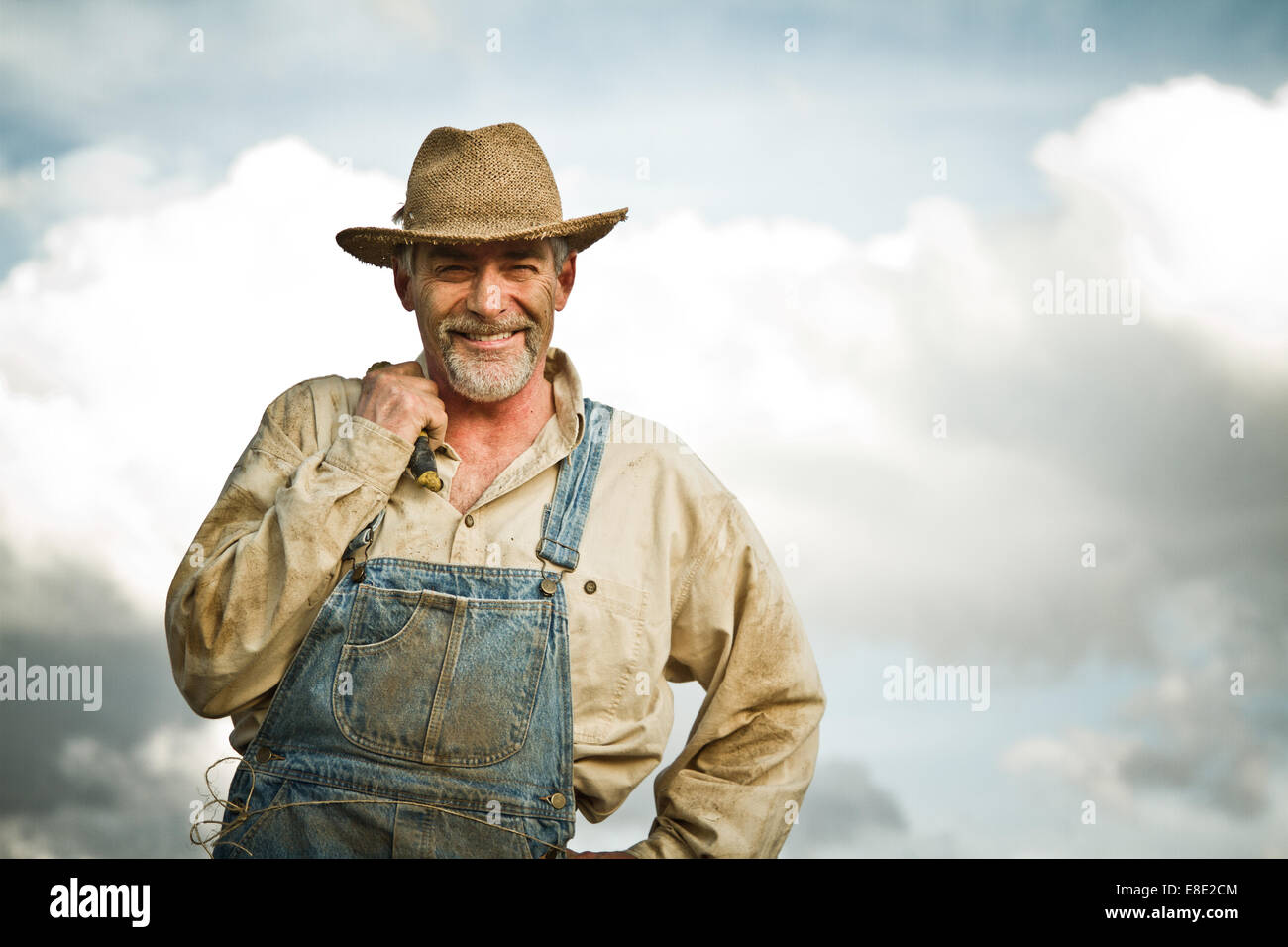 1930 farmer smiling at the camera Banque D'Images