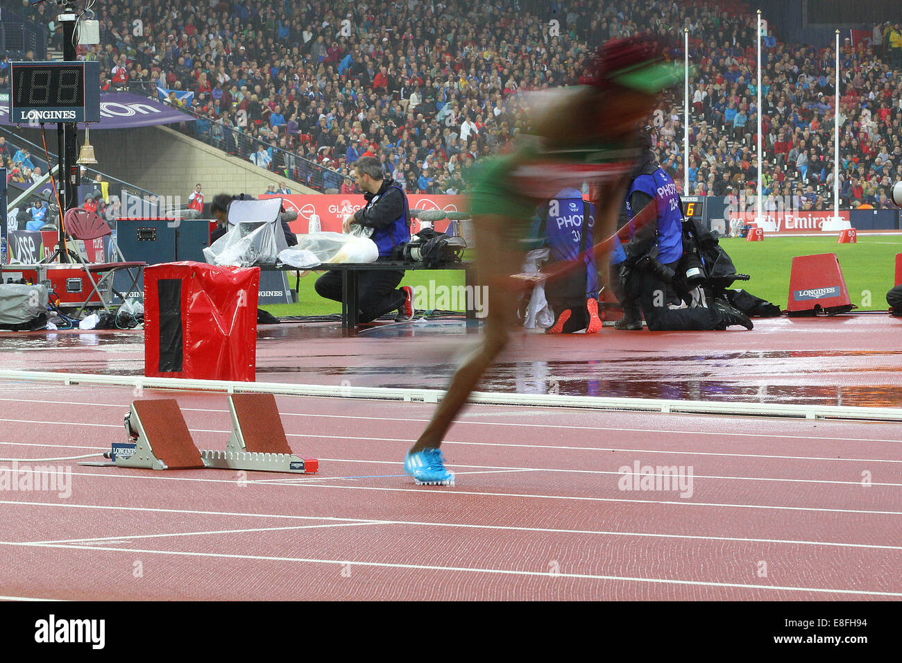 Le départ de la course. blocs. - 4 x 400 m Finale. Athlétisme - Hampden Park - Glasgow - Royaume-Uni - 02/08/2014 - Commonwealth Gam Banque D'Images