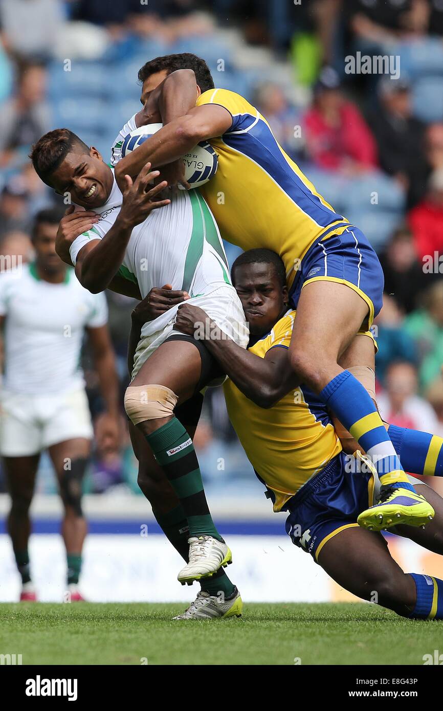 Richard Dharmapala (SRI) est abordé par Nicholas Jackman (BAR) et Philip Lucas (BAR). Sri Lanka v la Barbade. - Rugby à 7 Banque D'Images