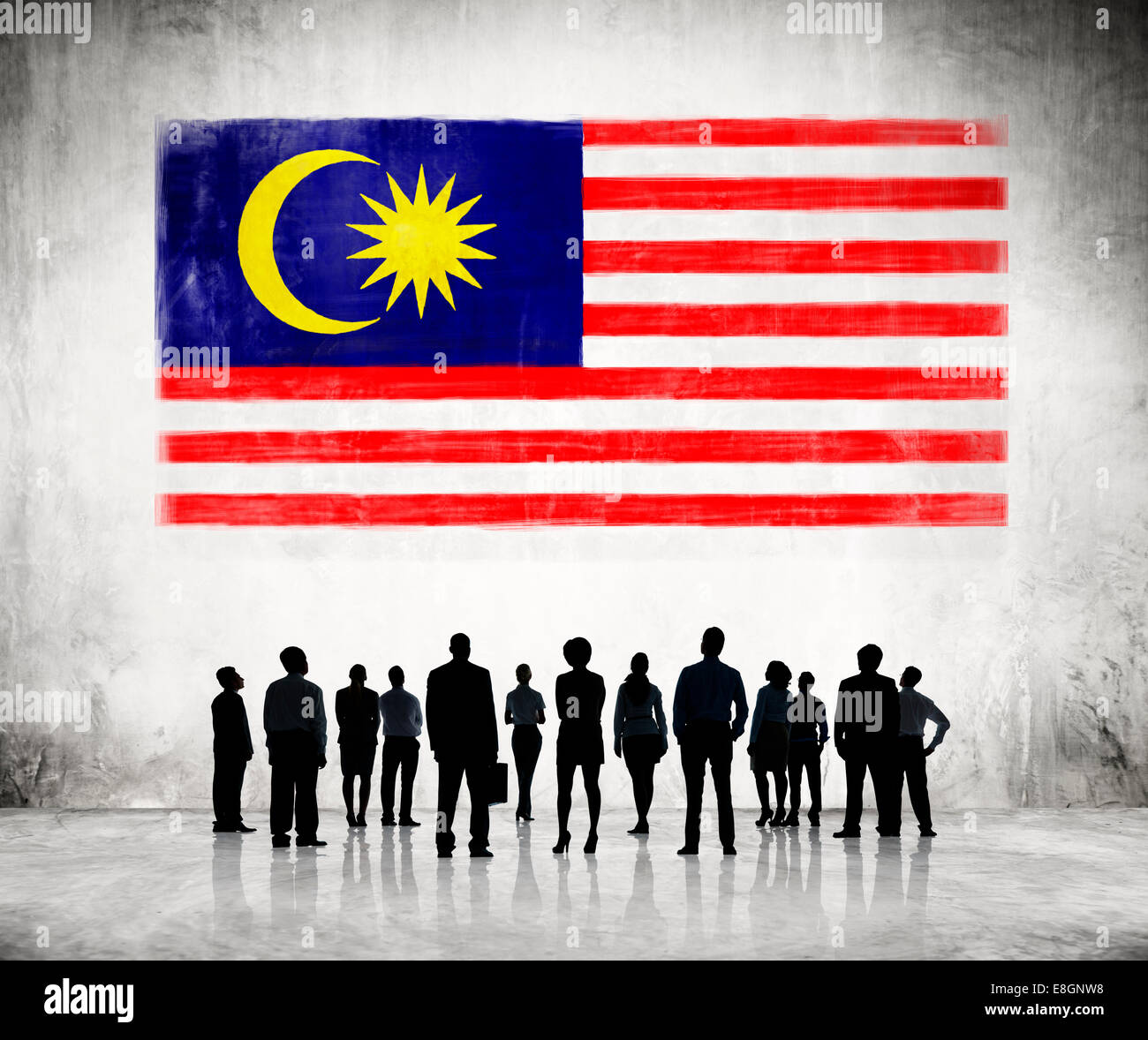 Silhouettes de gens d'affaires à la recherche au pavillon malaisien Banque D'Images