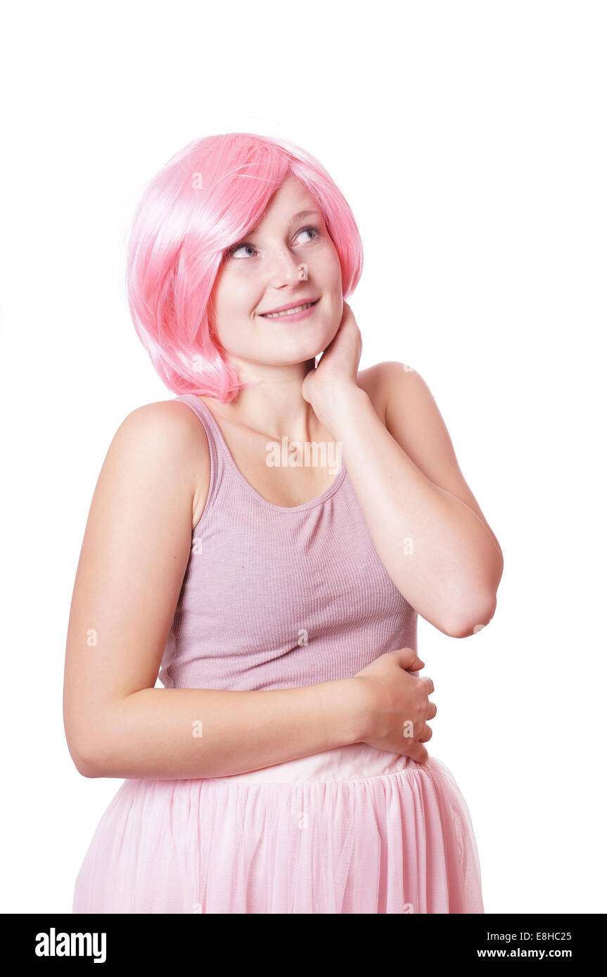 Jolie jeune femme fille vêtue de rose la pensée ou de l'examen d'une idée Banque D'Images