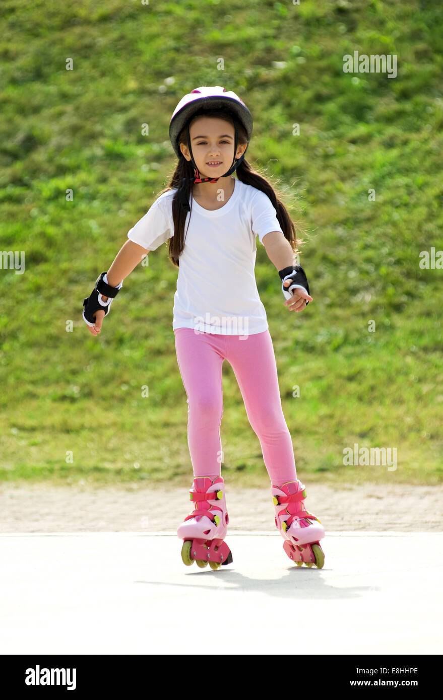 Petite fille de roller Banque D'Images