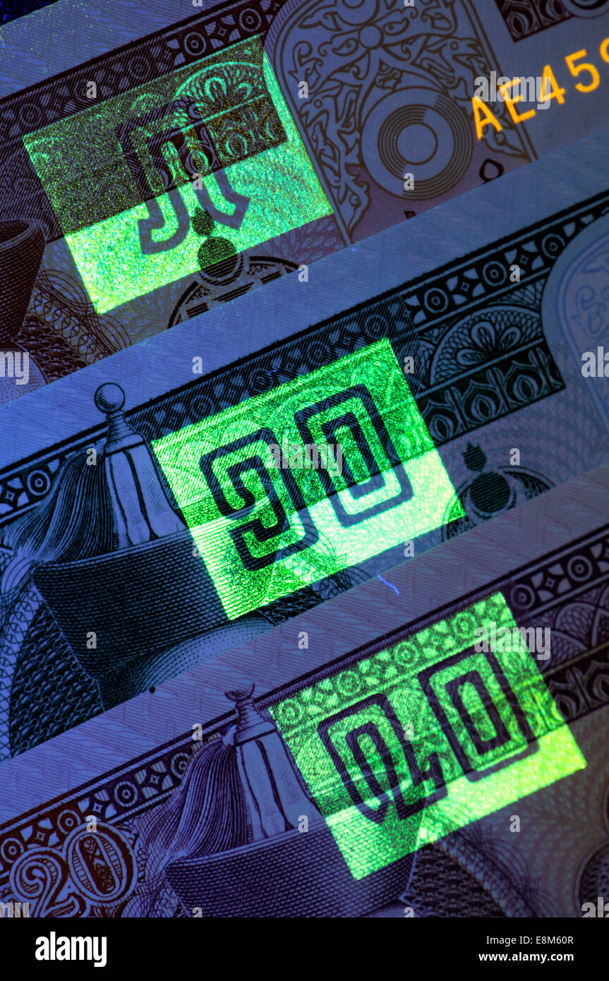 De sécurité sur les billets mongols visible que sous la lumière ultra-violette - montrant coupures : 5, 10, 20 Banque D'Images