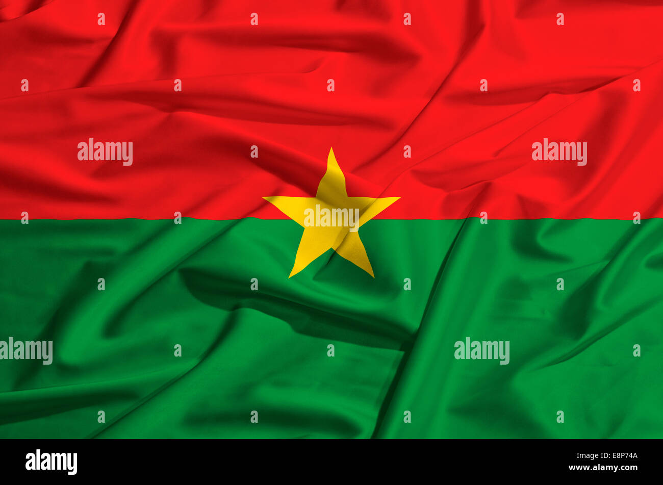 Burkina Faso drapeau sur un drap de soie forme Banque D'Images