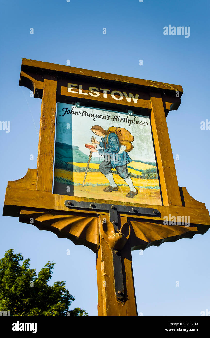 Panneau du village en ELSTOW Bedfordshire dédié à John Bunyan Banque D'Images