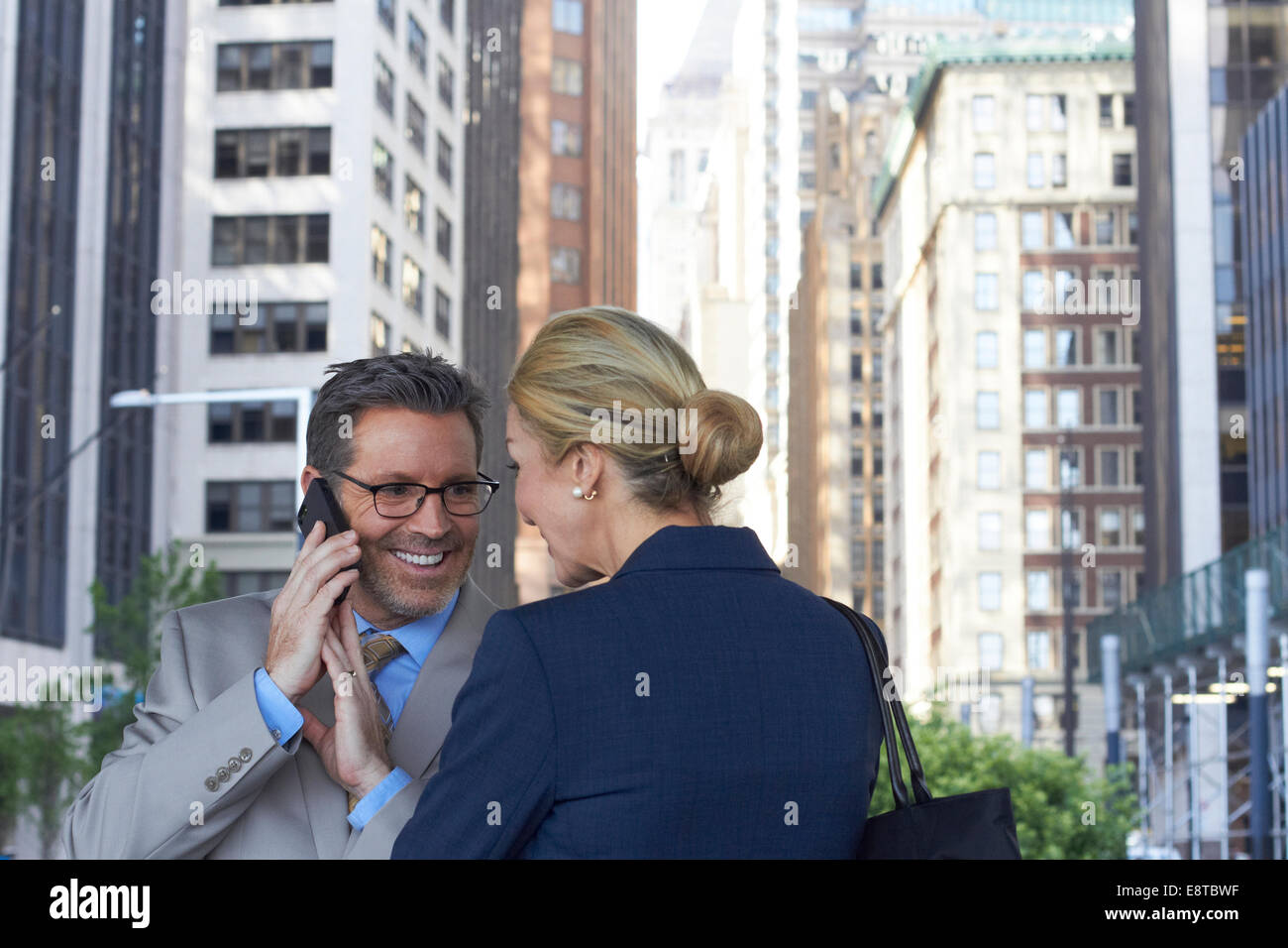 Caucasian business people talking in city, New York City, New York, United States Banque D'Images