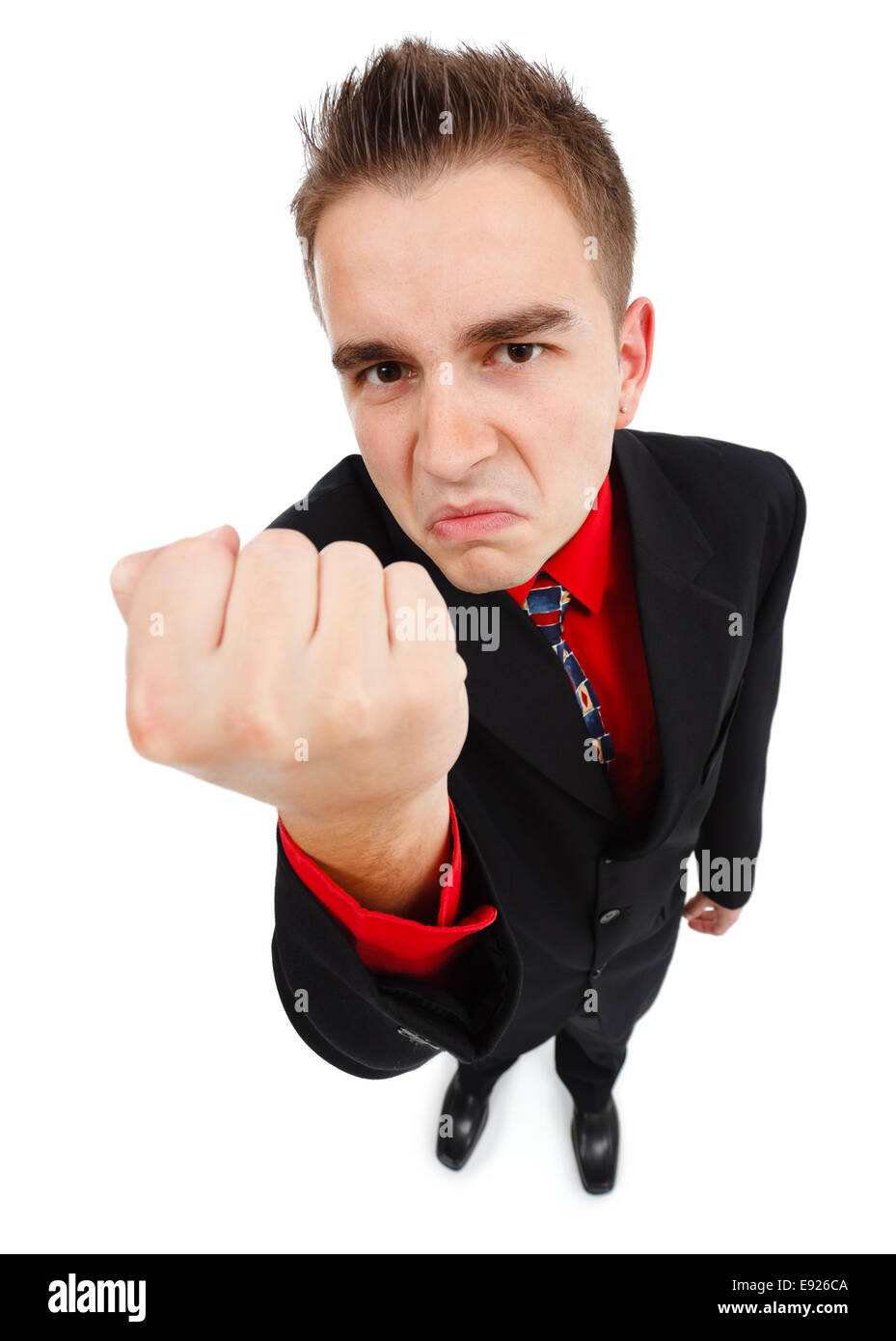 Vue grand angle d'un jeune homme en colère, montrant un fist Photo Stock -  Alamy