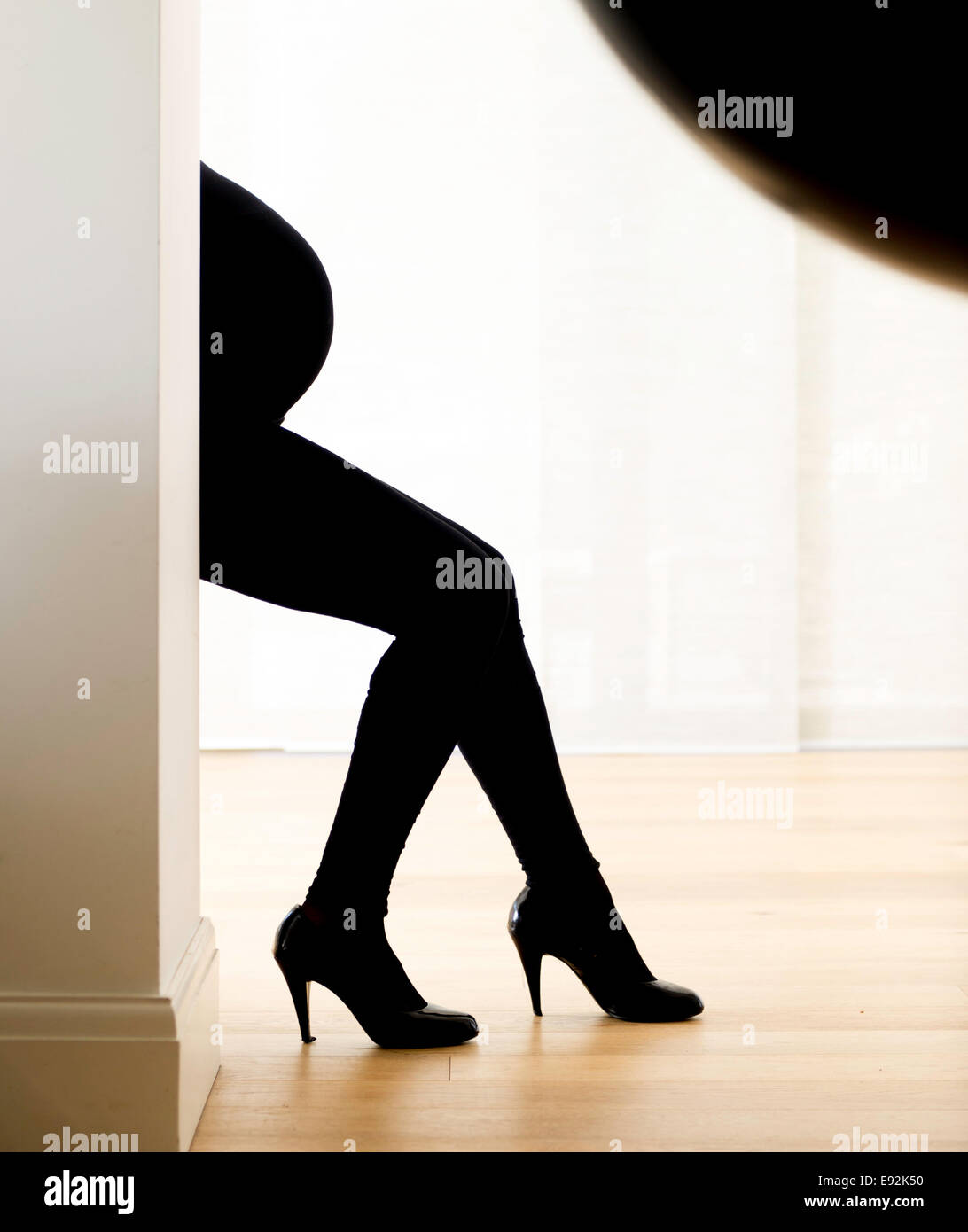 Pregnant woman in High heels Banque D'Images