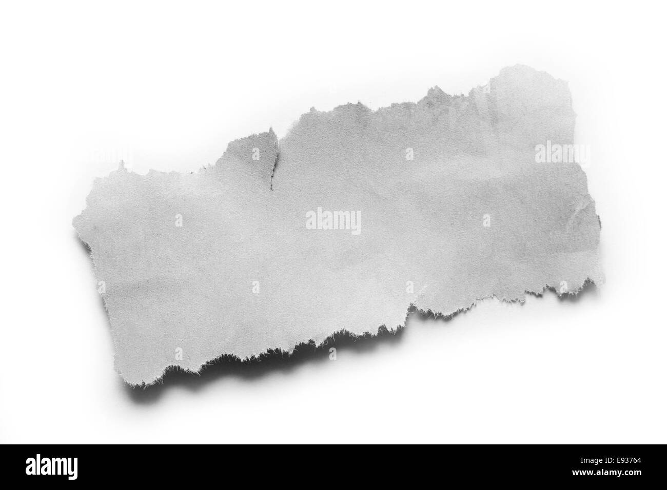 Morceau de papier déchiré sur fond uni Banque D'Images