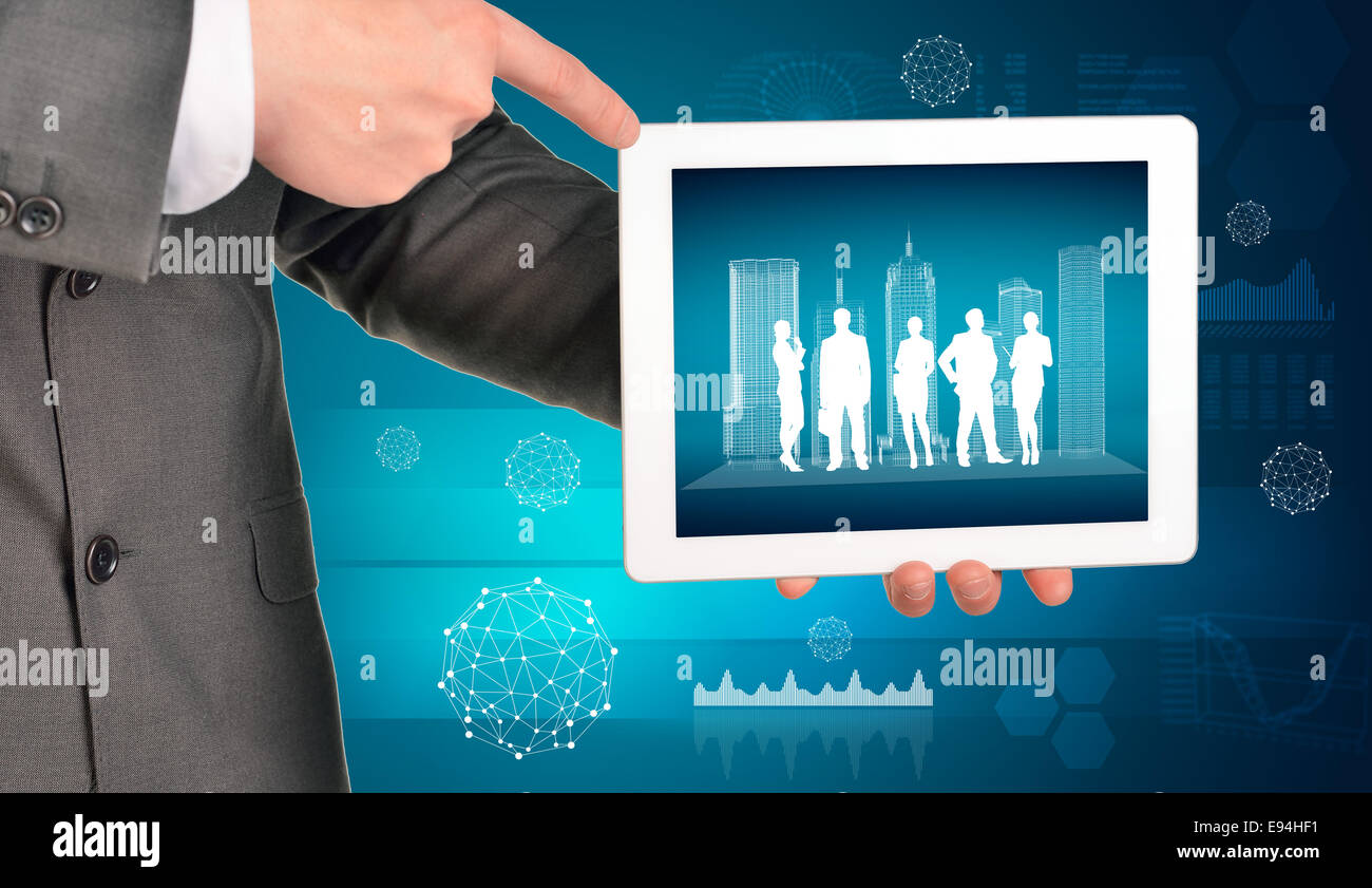 Les mains de l'homme à l'aide de tablet pc avec des bâtiments en fil de fer et les silhouettes sur écran Banque D'Images Les mains de l'homme à l'aide de tablet pc avec des bâtiments en fil de fer et les silhouettes sur écran Banque D'Images