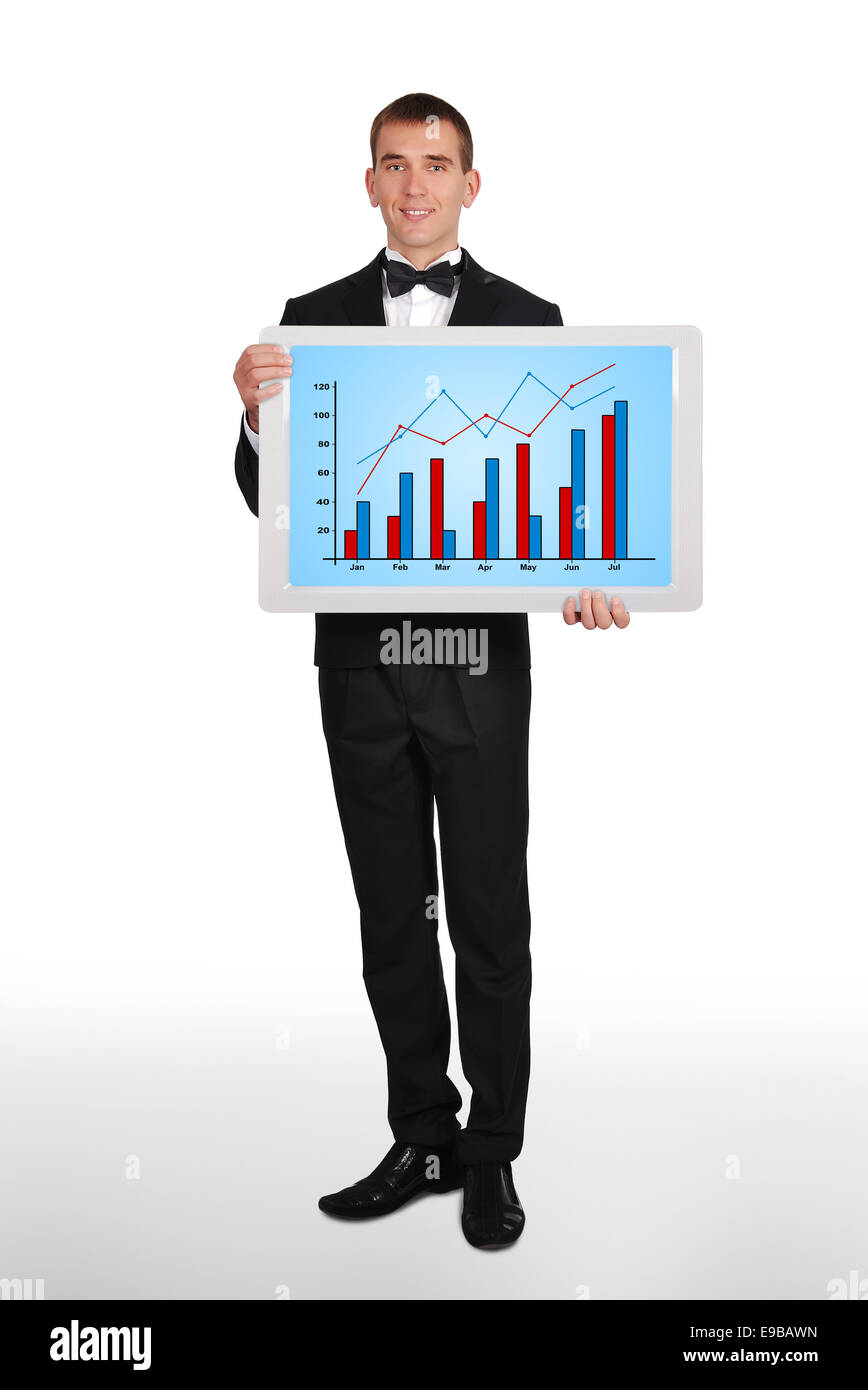 Man in tuxedo holding plasma avec graphique Banque D'Images
