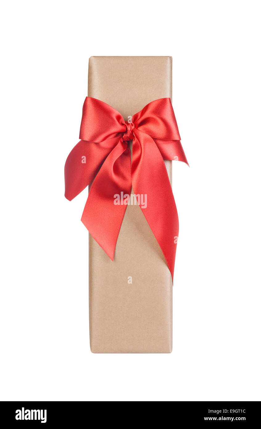 Cadeau de Noël avec un magnifique arc rouge sur fond blanc Banque D'Images