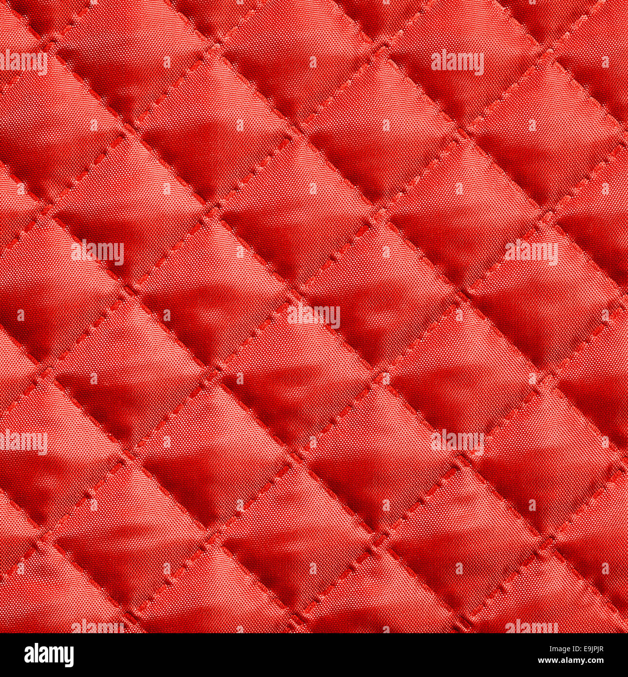 Tissu matelassé de soie rouge pour le fond Photo Stock - Alamy