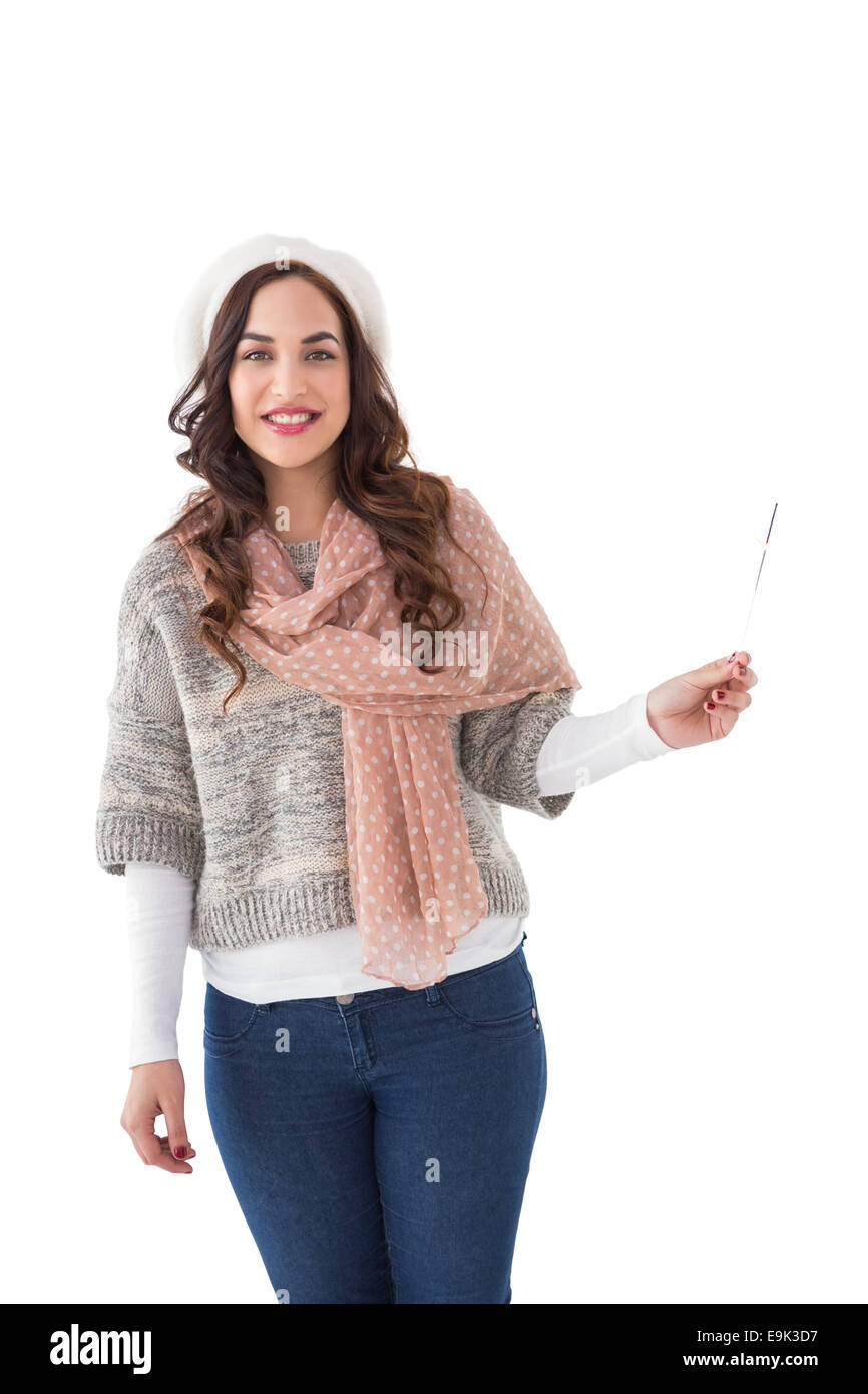 Brunette in winter clothes holding Banque D'Images