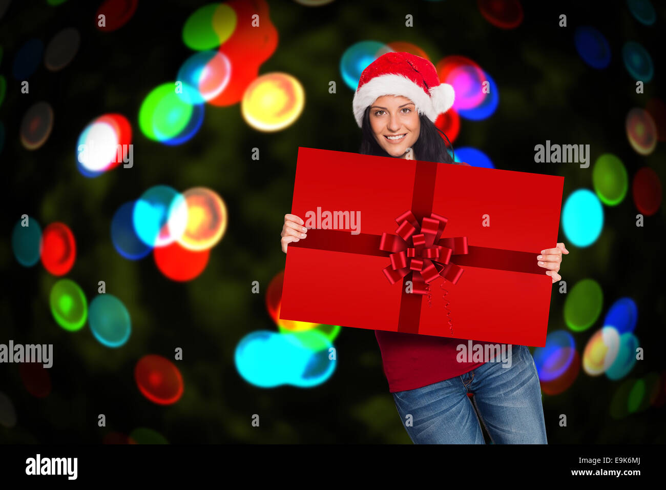 Image composite de woman holding a sign Banque D'Images