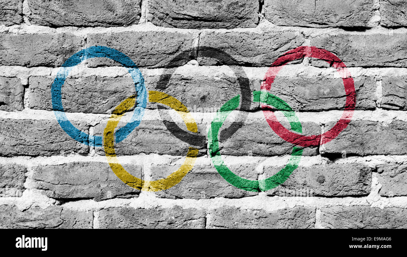 La texture du mur de brique très ancien, anneaux olympiques Banque D'Images