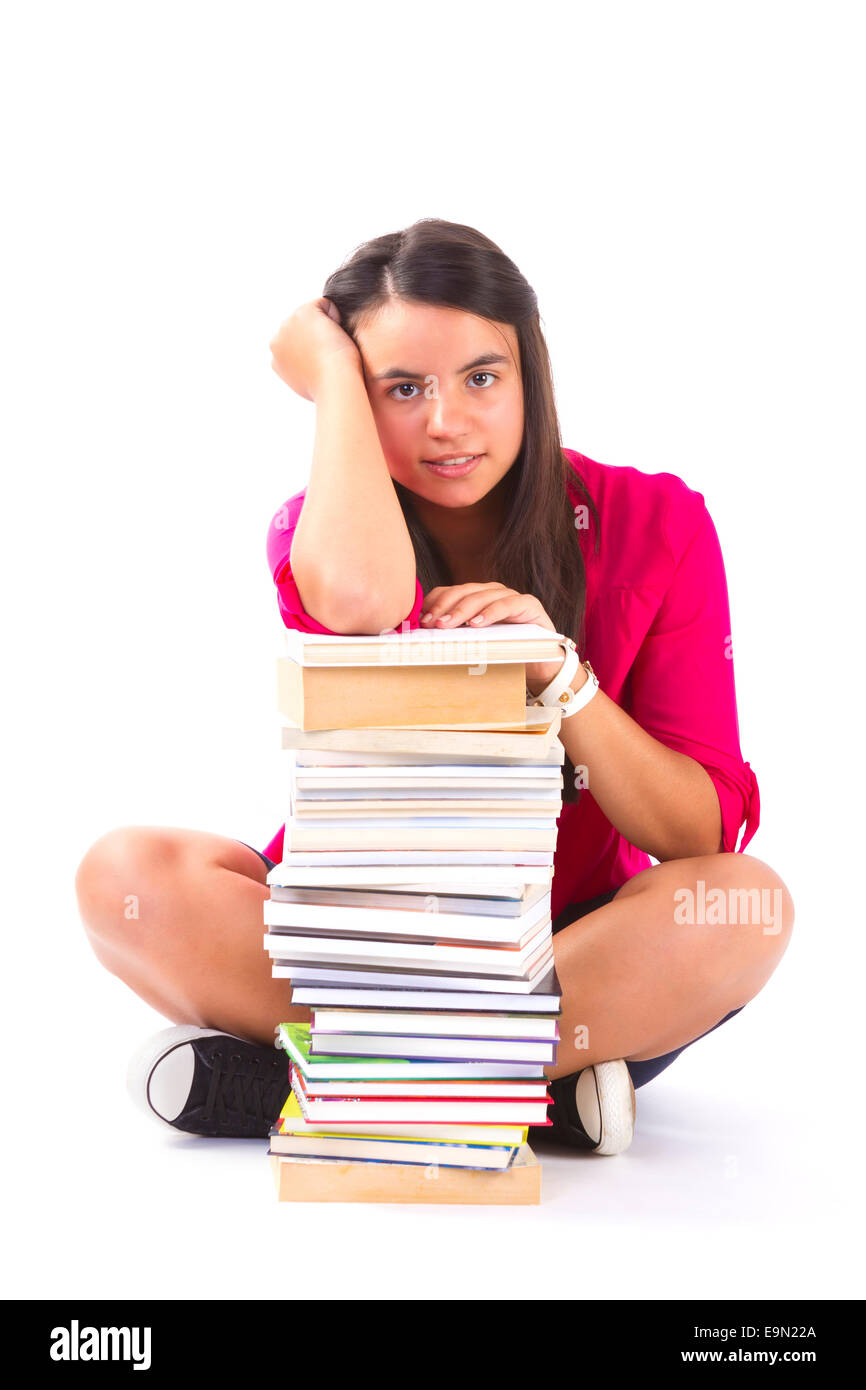 Portrait d'une fille adolescente avec ses livres isolated over white background Banque D'Images