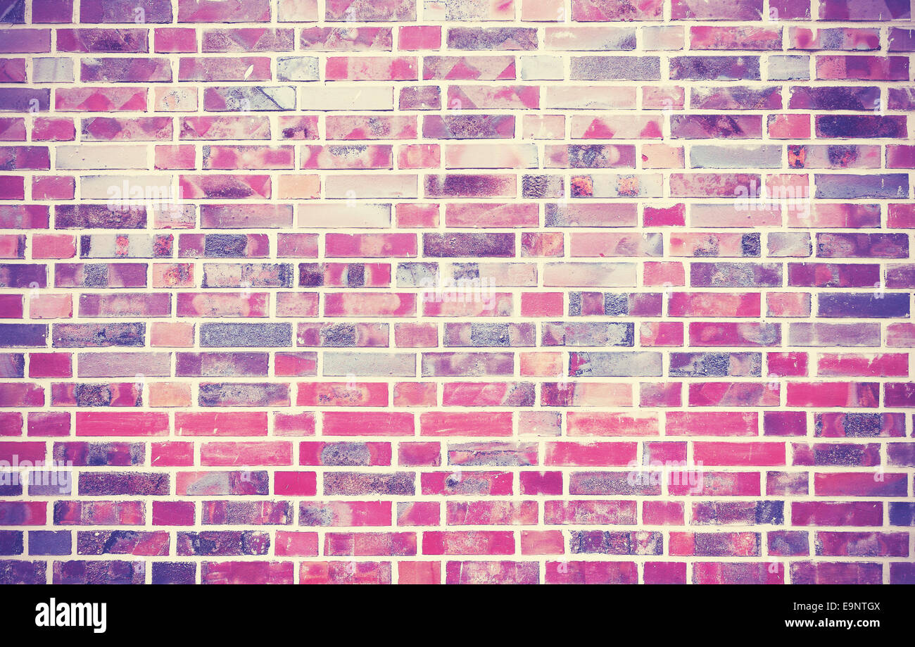 Mur de brique grunge background avec vignetted coins. Banque D'Images