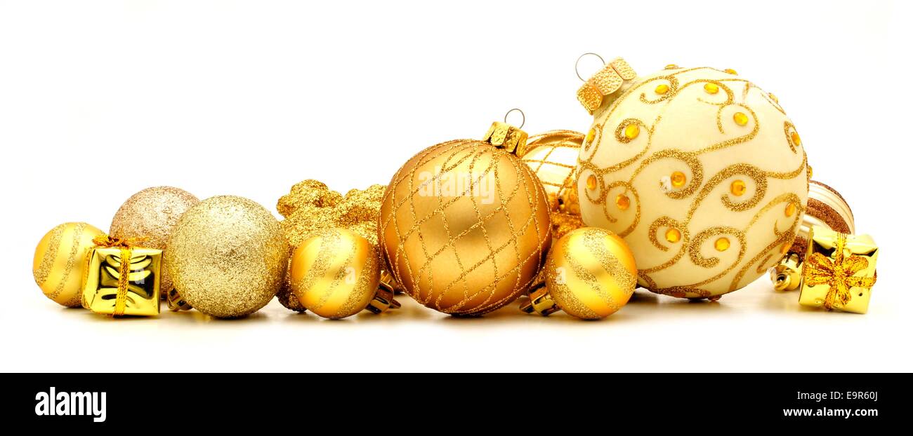 Collection de boules de Noël en or formant une frontière Banque D'Images