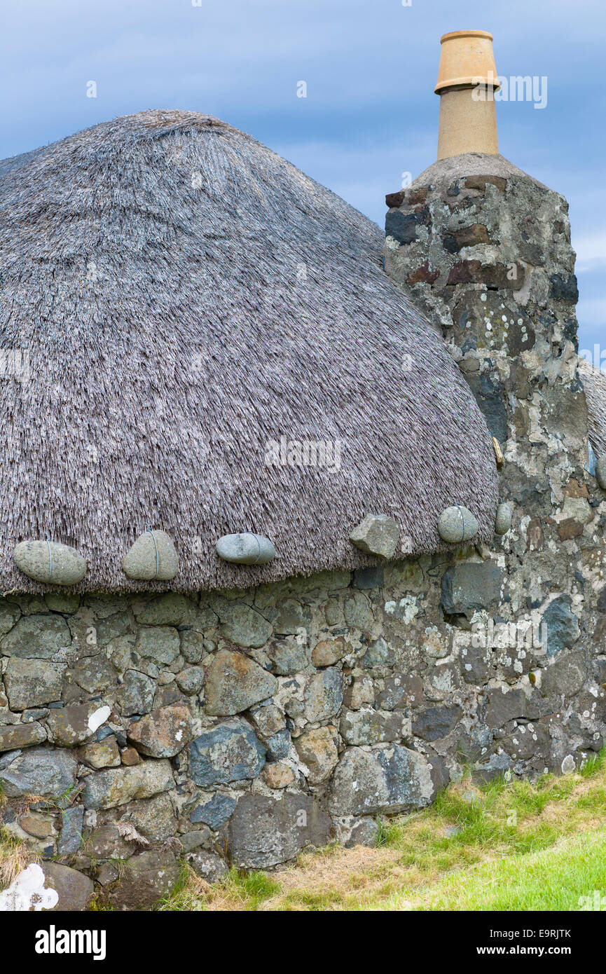 Attraction touristique Skye Museum de la vie de village en pierre au toit de chaume dépeint dans d'anciens cottages au logement crofting Kilmuir, île de S Banque D'Images