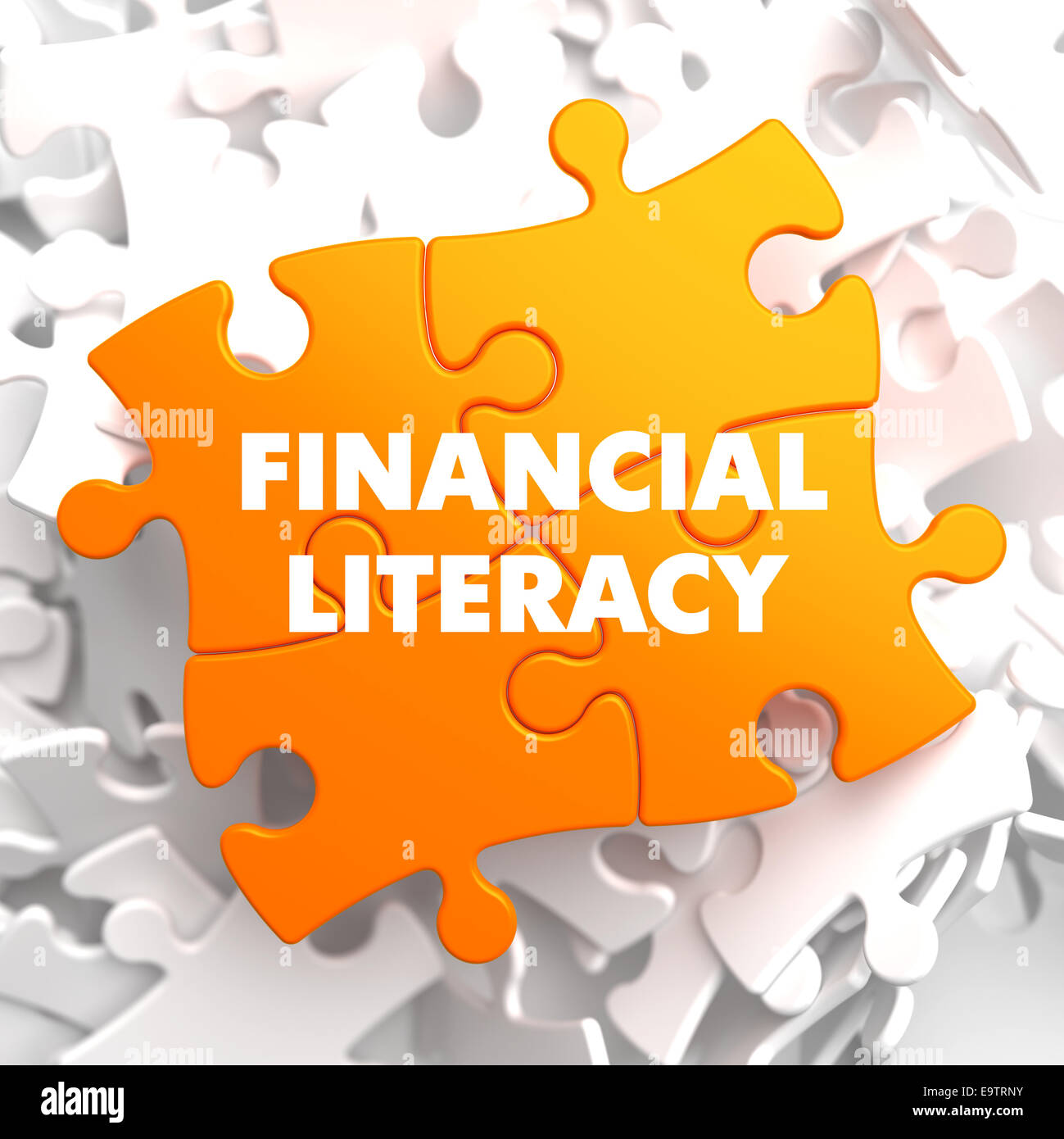 Sur la littératie financière Puzzle orange sur fond blanc. Banque D'Images