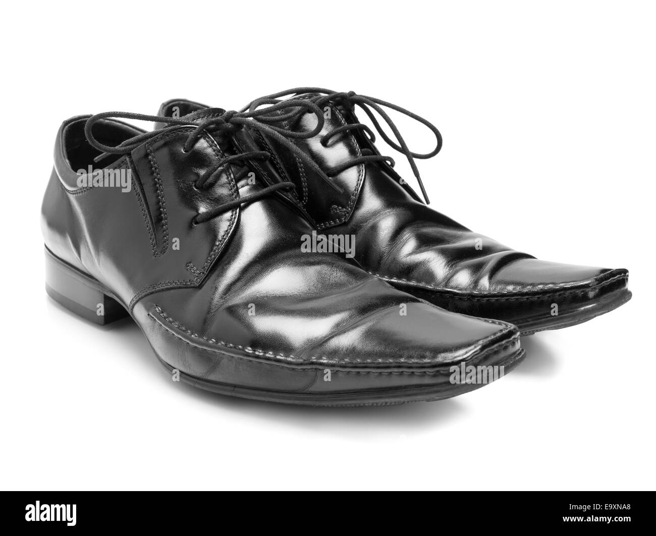 Chaussures d'hommes gros plan sur fond blanc Banque D'Images