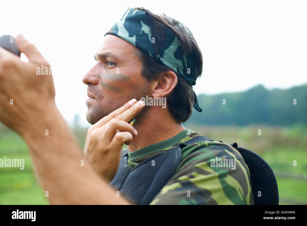 Joueur de paintball de combat en Banque D'Images