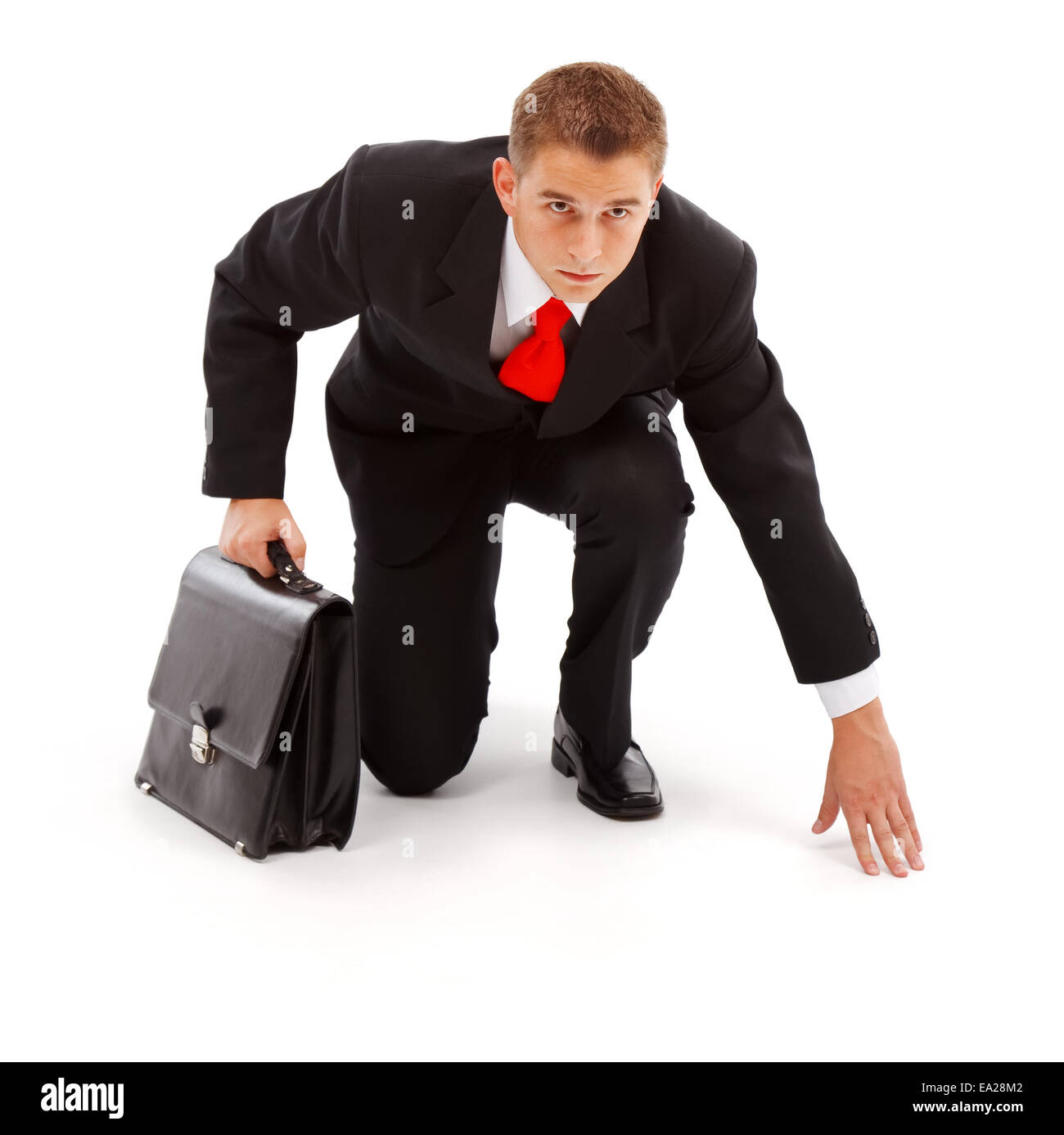 L'homme d'affaires avec valise, prête à l'emploi. Isolated on white Banque D'Images