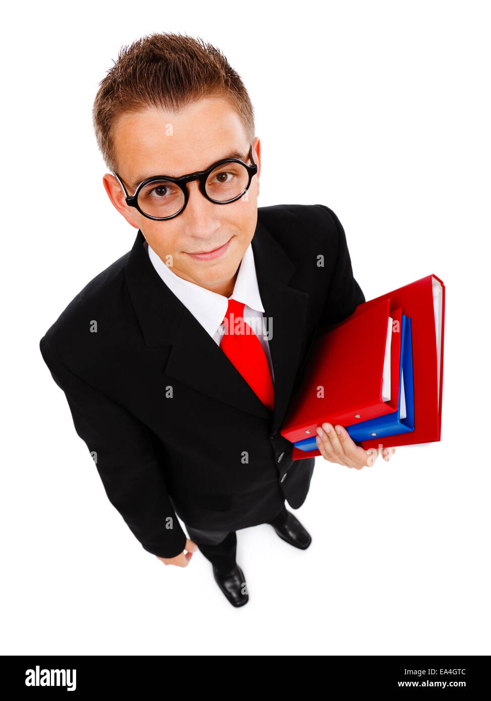 Vue de dessus d'un jeune homme d'affaires, étudiant ou enseignant avec les dossiers en main, portant des lunettes Banque D'Images
