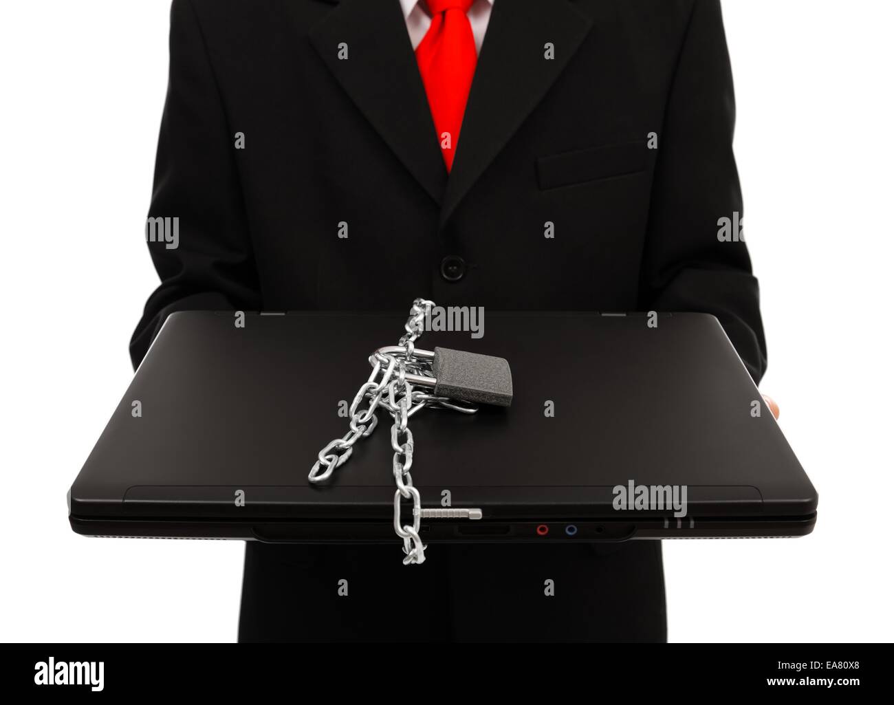 Business man holding enchaîné et verrouillé de l'ordinateur portable Banque D'Images