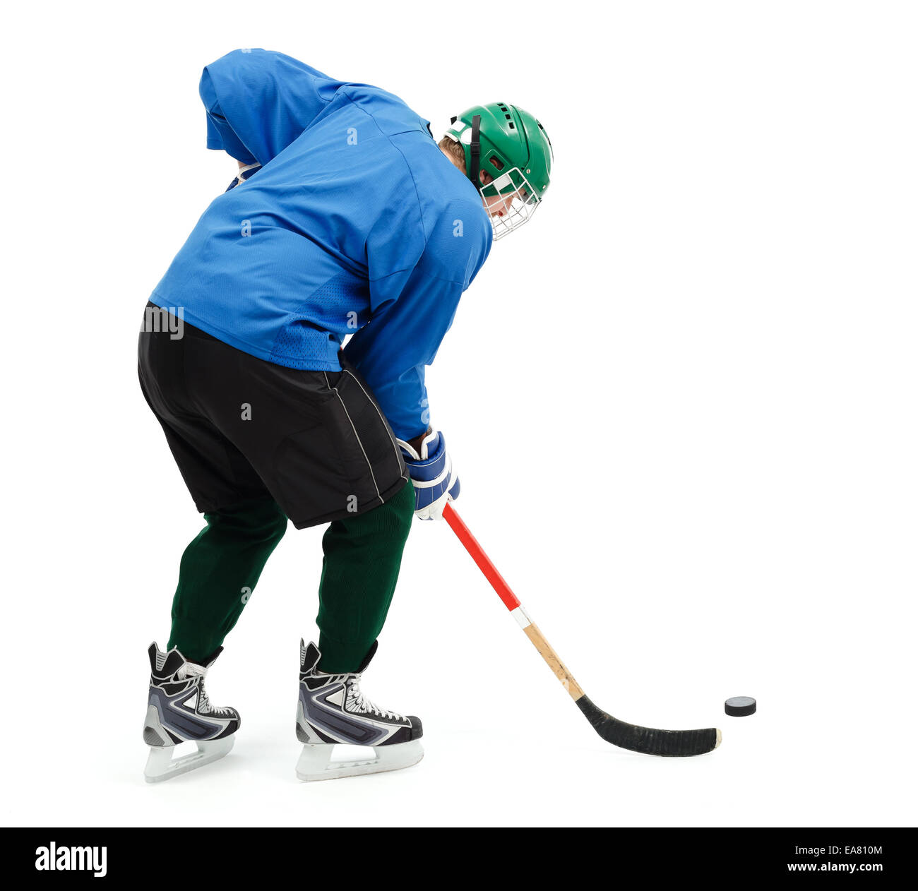 En hockey sur glace usure bleu et vert casque Banque D'Images