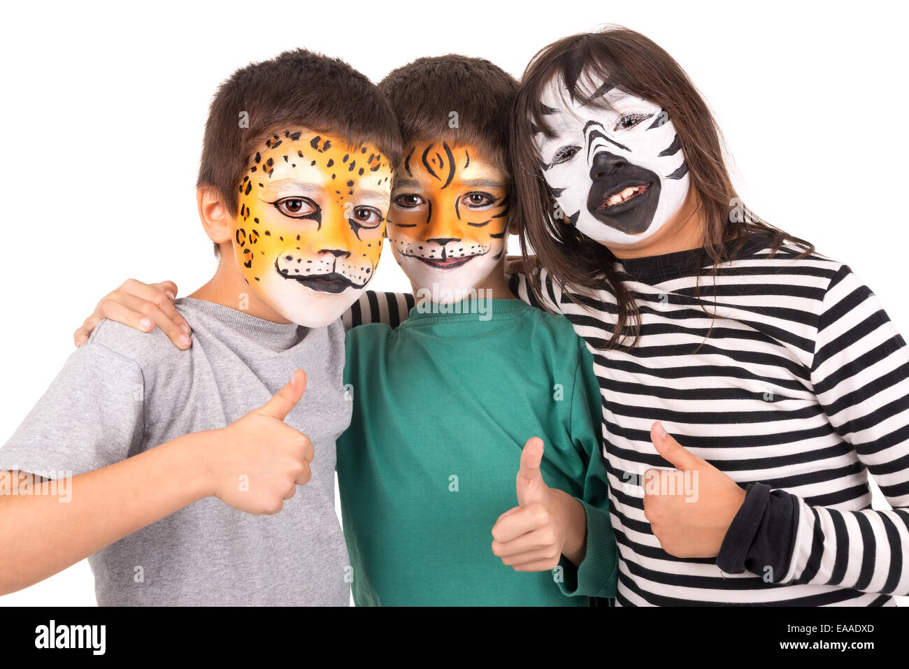 Groupe d'enfants avec face-paint en blanc isolé Banque D'Images